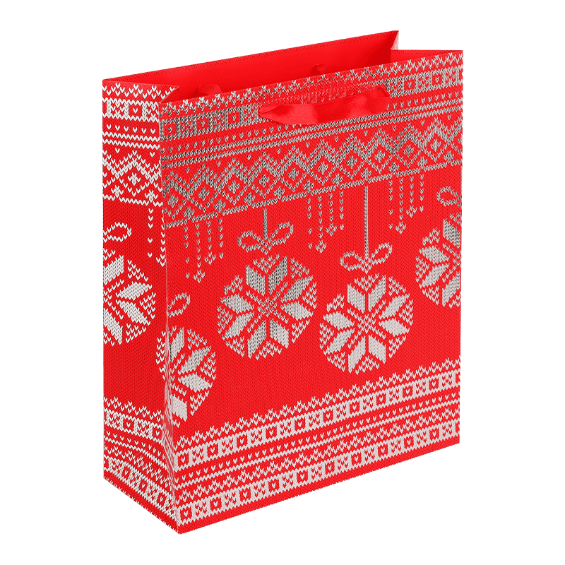 Bolsa de regalo de papel navideño con estampados navideños variados