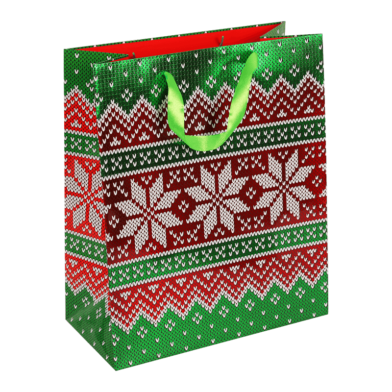 Bolsa de regalo de papel navideño con estampados navideños variados