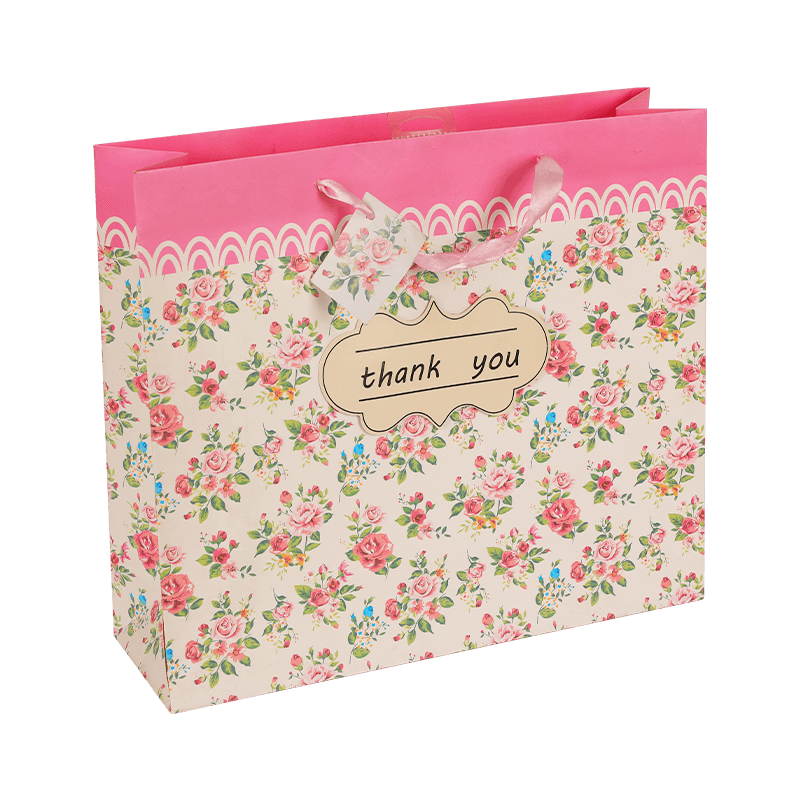 Bolsa de recuerdos de papel con estampado de flores de rosas de colores