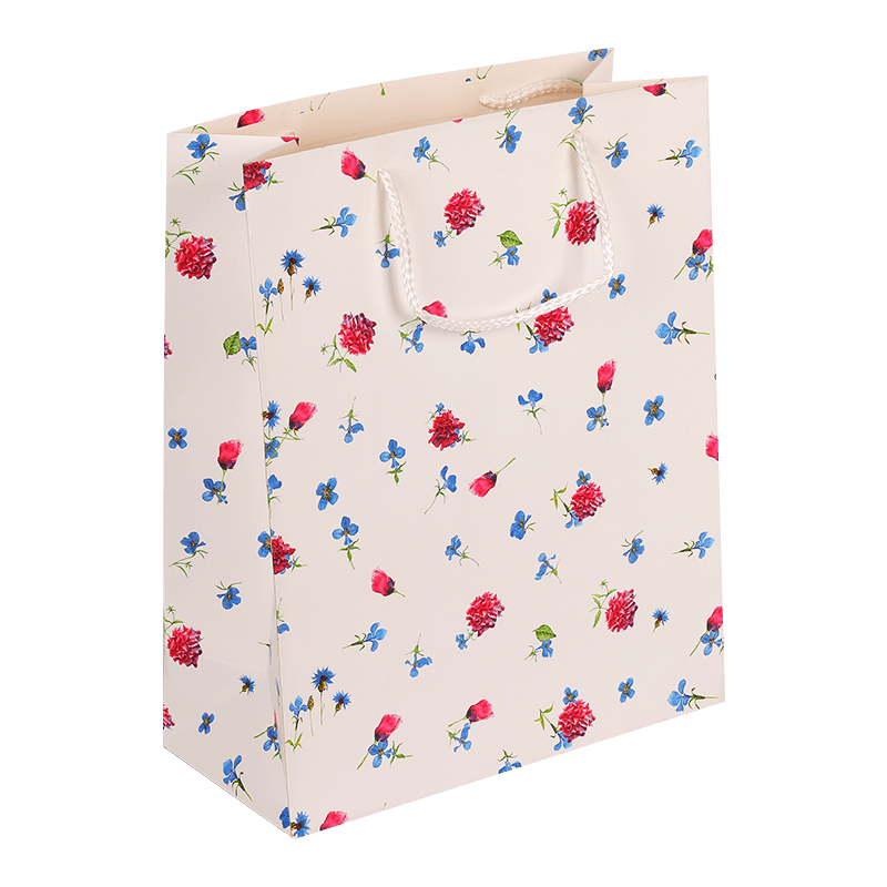 Bolsa de regalo de papel con estampado floral y asa